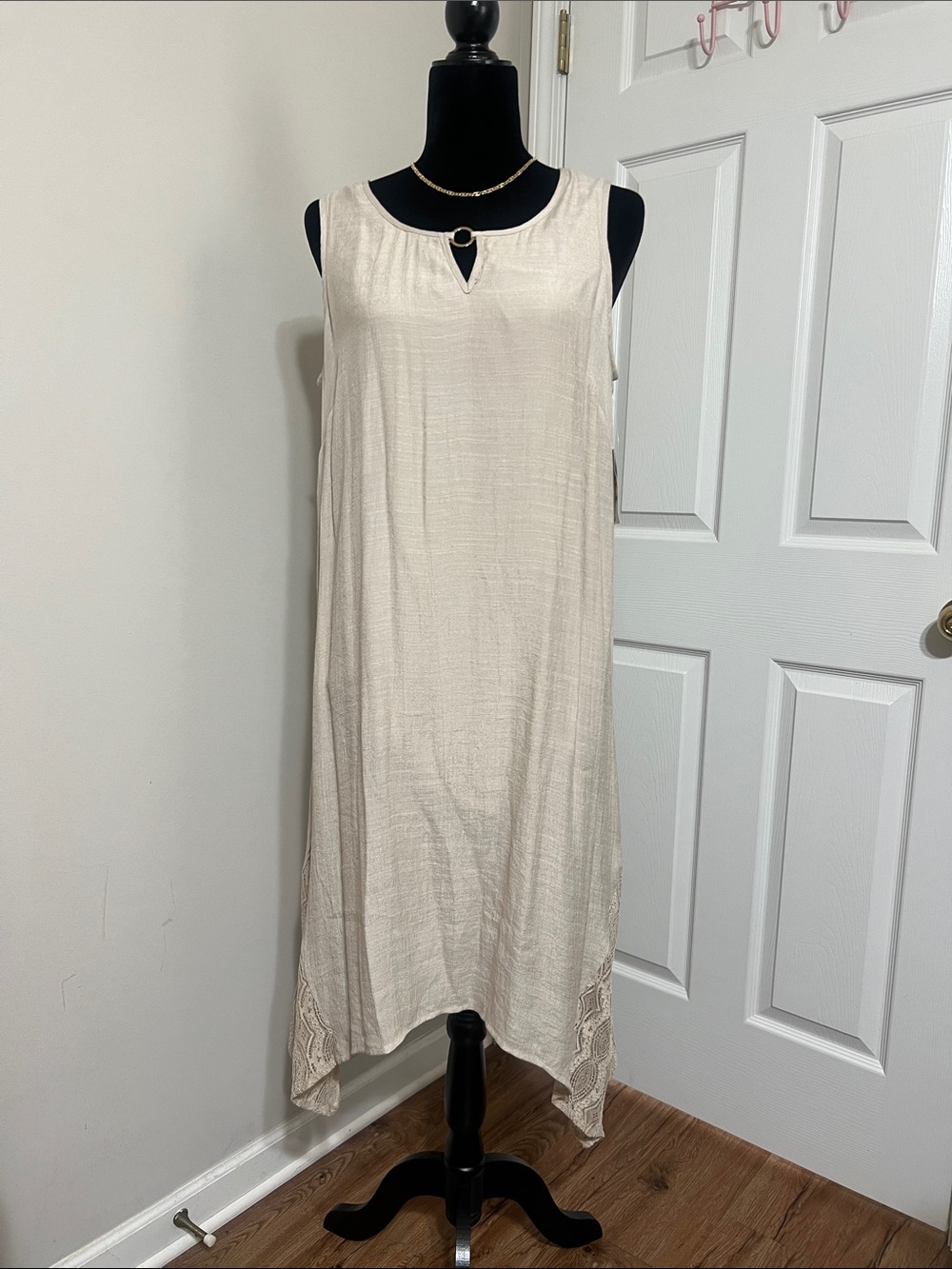 JM Collection Cream Sleeveless Asymmetrical Hem Dress with Ring Neck Detail